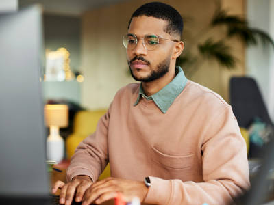 Young Man Typing